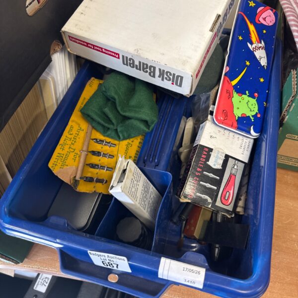 Tray of assorted arts and crafts materials and tools.