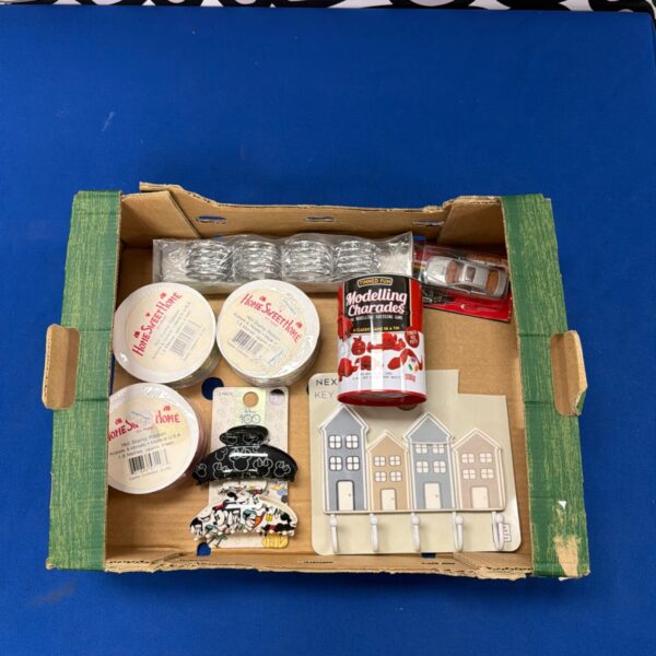 Arts and crafts supplies lot including modelling clay and ribbon.