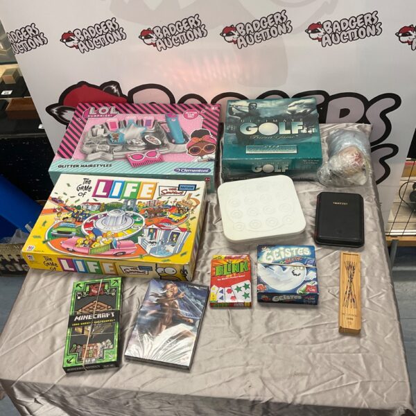 Assorted board games and toys including Minecraft and The Simpsons.