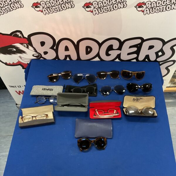 Lot of assorted vintage and retro sunglasses for sale.