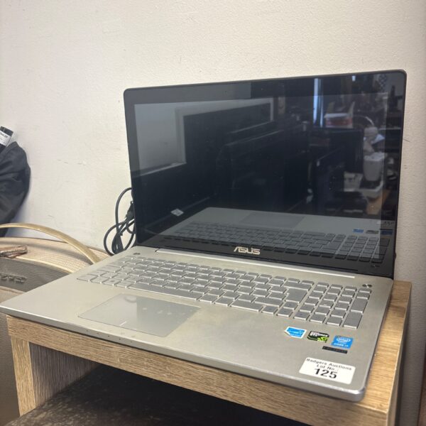 ASUS N5550J laptop computer for auction, as-seen condition.