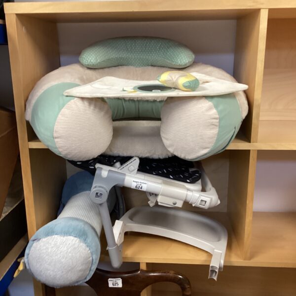 Convertible baby high chair and sit-up chair in used condition.