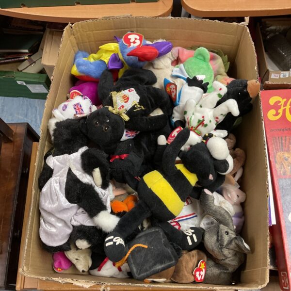 Box of vintage Beanie Babies and TY soft toys for collectors.