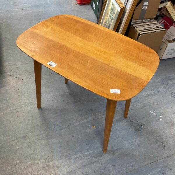 Vintage beech coffee table with tapered legs, mid-century modern style.