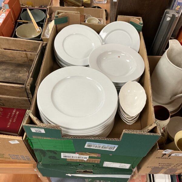 Three trays of white Bidasoa tableware stacked and ready for auction.