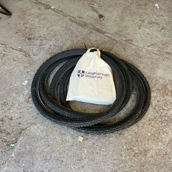 Lot of four used bike tyres for bicycles.
