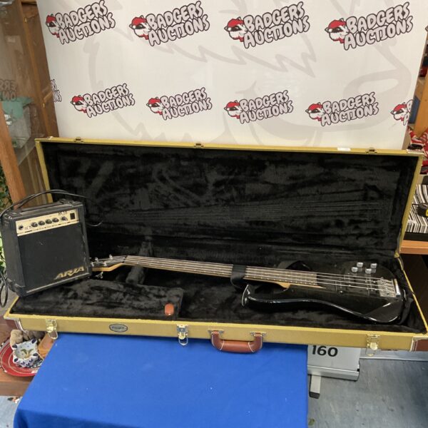 Black gear4music bass guitar with Aria practice amplifier in auction.