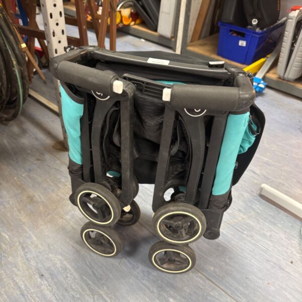 Blue folding pet pram for small dogs and cats.