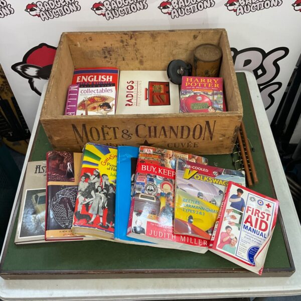 Vintage book lot with Arsenal crate and petrol cap.
