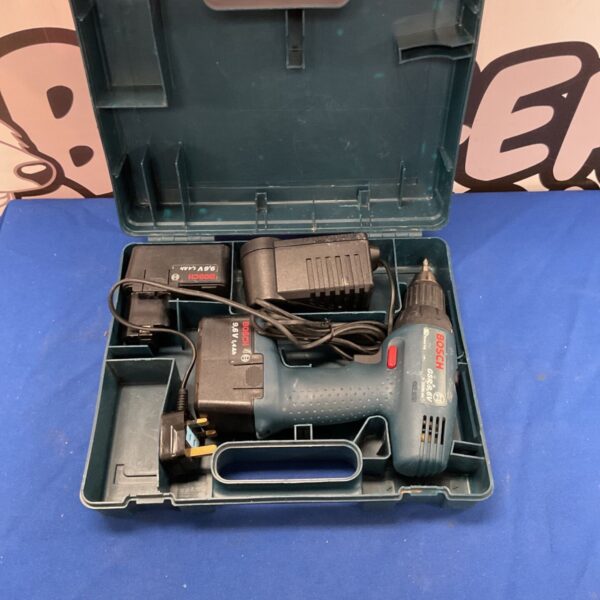 Bosch 9.6V cordless drill set in green carry case.