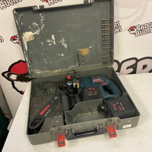 Bosch GSB 18V-55 hammer drill in open carrying case with batteries.