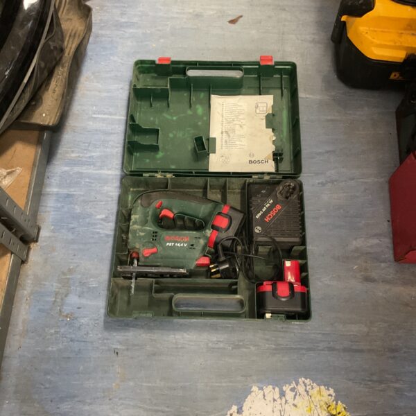 Bosch PST 14.4 V cordless jigsaw kit open showing contents.