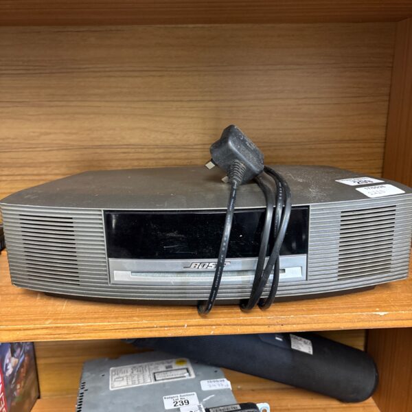 Front view of a vintage Bose Wave music system with CD player.
