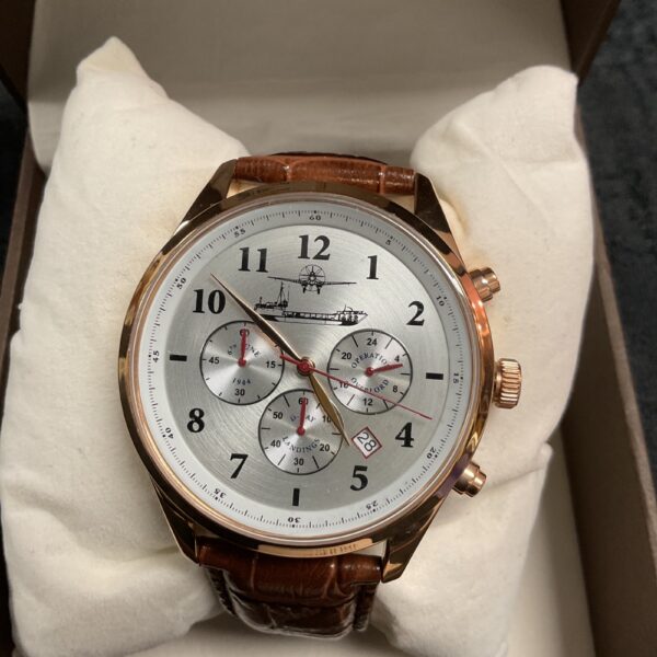Bradford Exchange D-Day watch with detailed dial and gold-toned case.