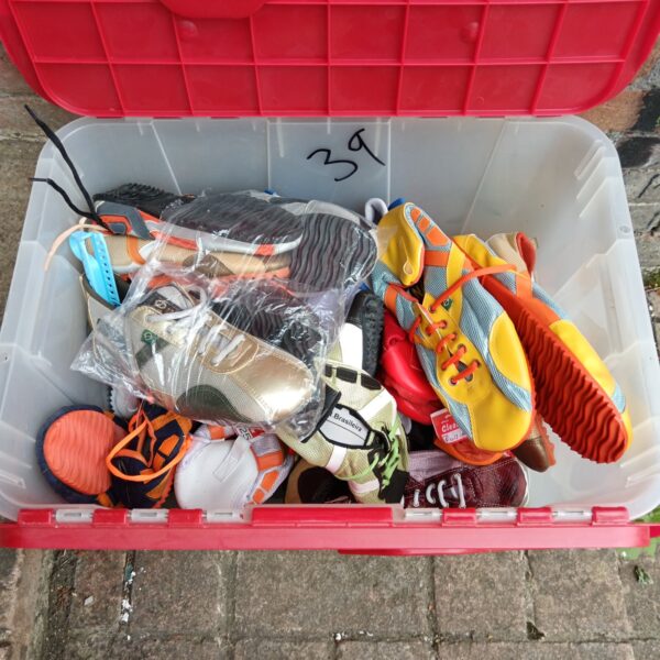 Bulk lot of new vintage Brasileira sneakers in colourful designs.