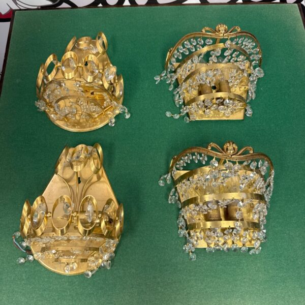 Vintage brass bead wall lights, a pair of decorative sconces.