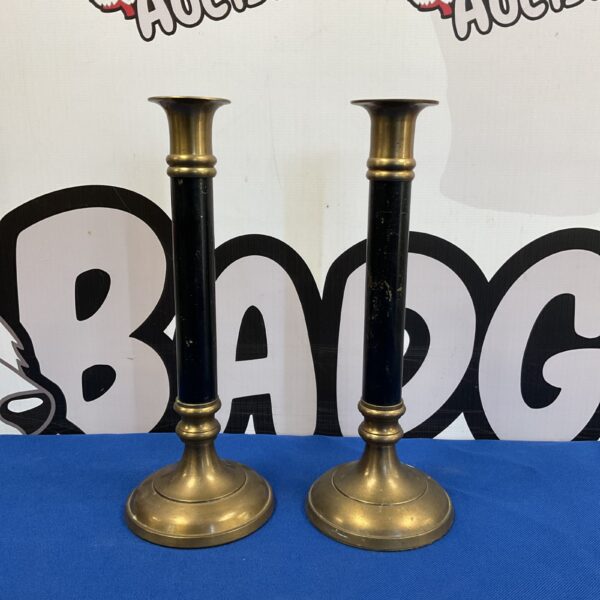 Pair of vintage brass column candlesticks for home decor.