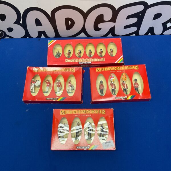 Vintage Britains hand-painted diecast soldier packs, collectible toy soldiers.