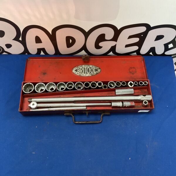 Vintage Britool socket set in a red metal toolbox, classic workshop tools.