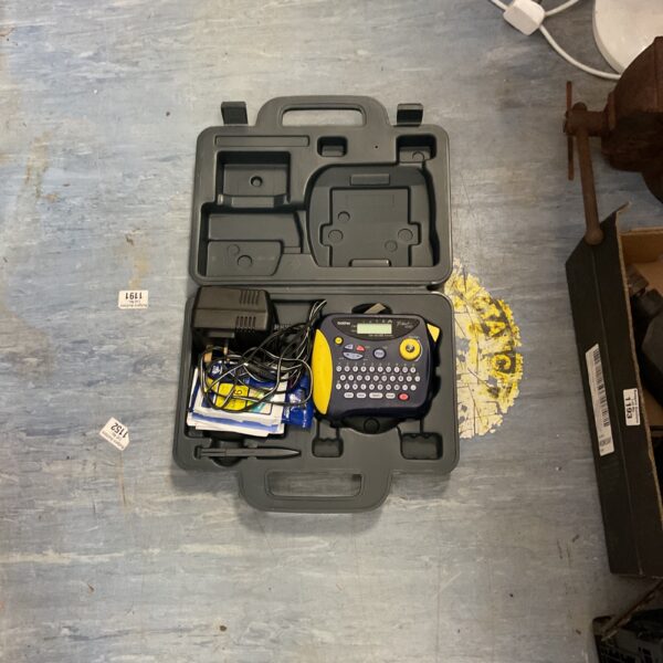 Brother P-Touch PT-1250 professional label maker in carrying case.