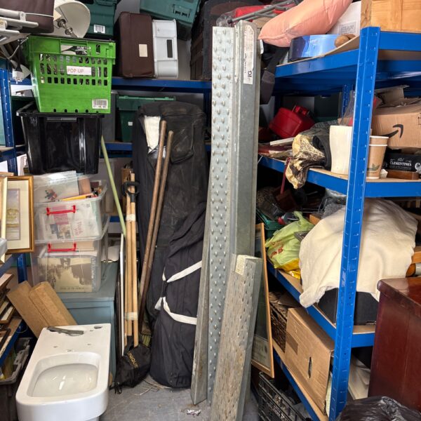 Stack of used steel builders lintels for construction projects.