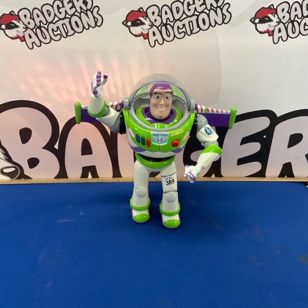 Vintage Buzz Lightyear toy from Toy Story, a collectible action figure.