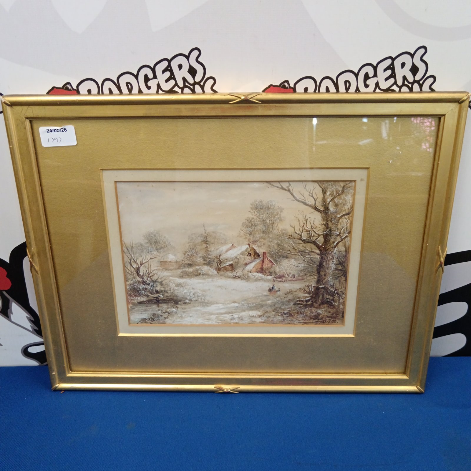 Signed C Thornton watercolour painting of a winter cottage scene.
