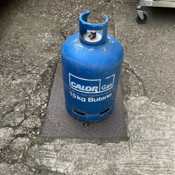 Blue Calor Gas 15kg butane bottle for outdoor use.