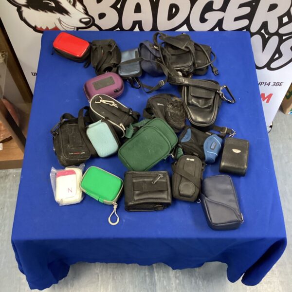 Bundle of camera bags including Fujifilm and Hama brands for photography.
