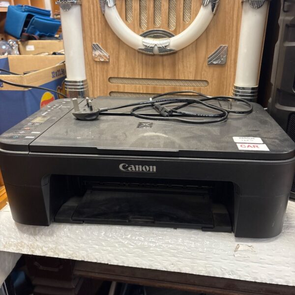 Canon Pixma TS3350 printer in used condition, side view.