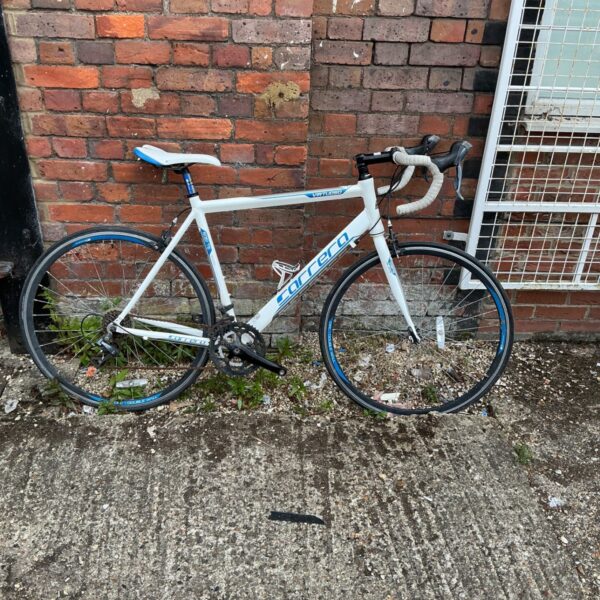 Silver and black Carrera Virtuoso road bike in detail.