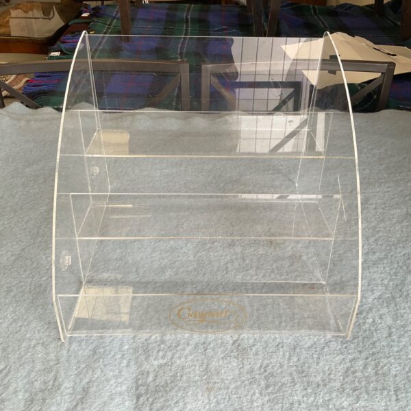 Vintage Caspari Perspex tie rack, clear acrylic, front view.