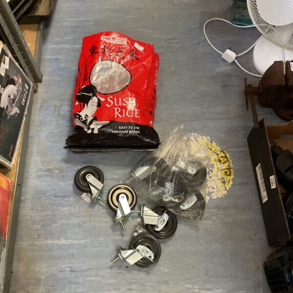 Bag of L-shaped side mount castor wheels for furniture projects.