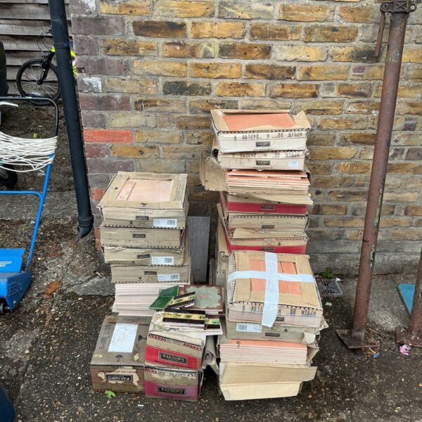 Stack of ceramic floor tiles ready for a renovation project.
