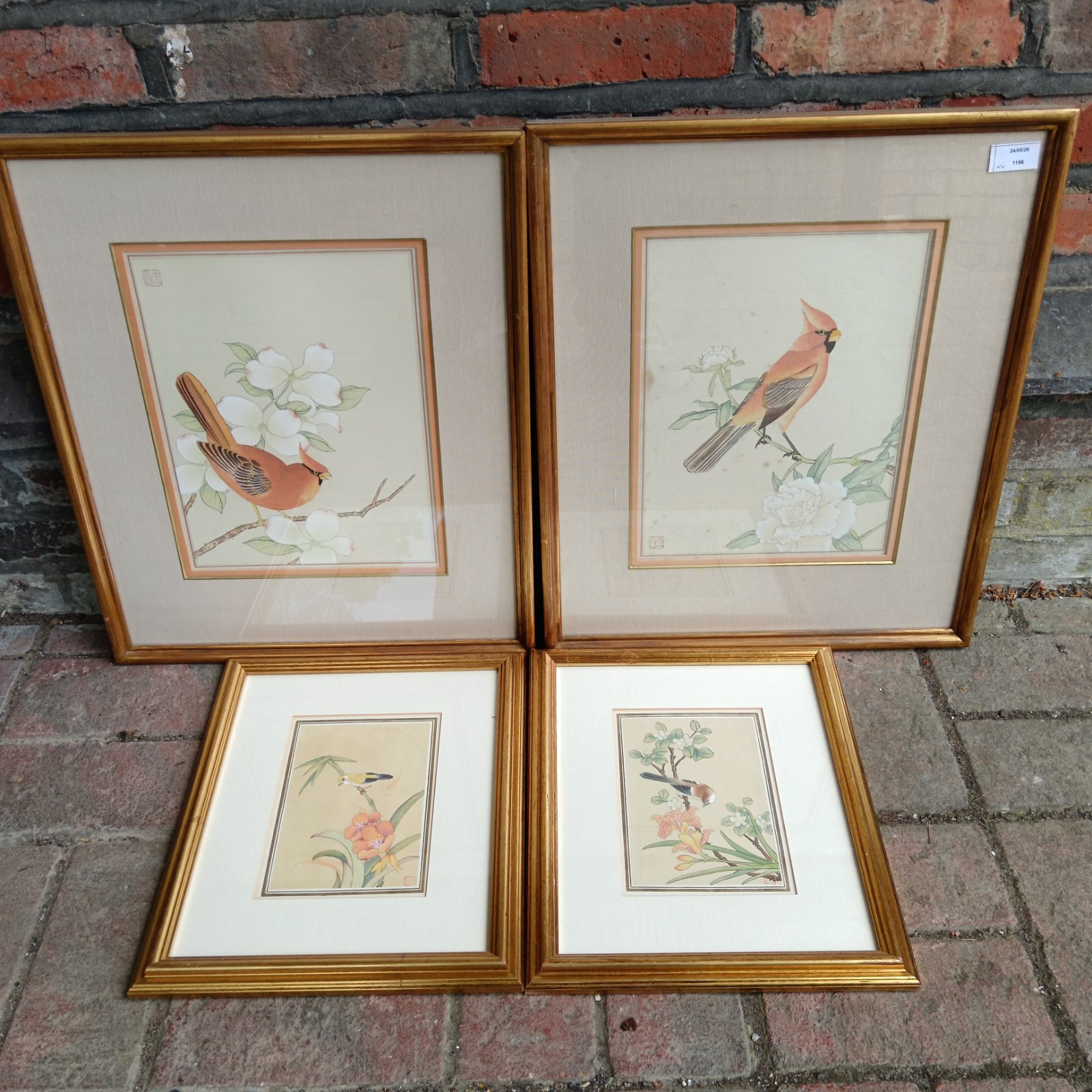 Gilt framed Chinese watercolour of a bird in blossom.