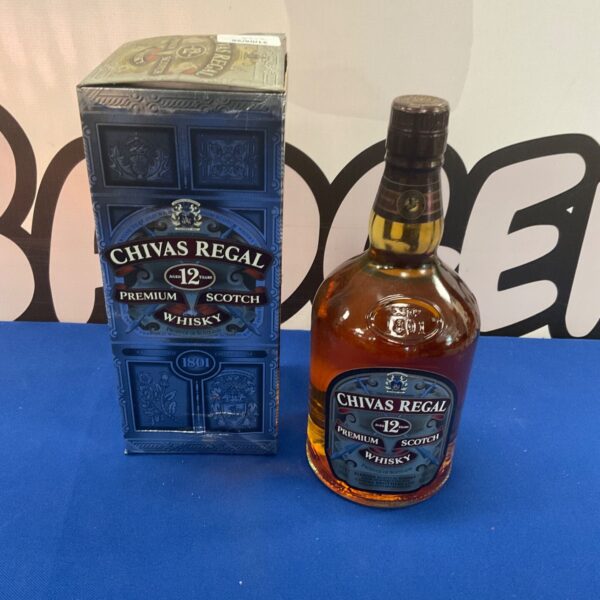 Bottle of Chivas Regal Premium Scotch Whiskey with label.