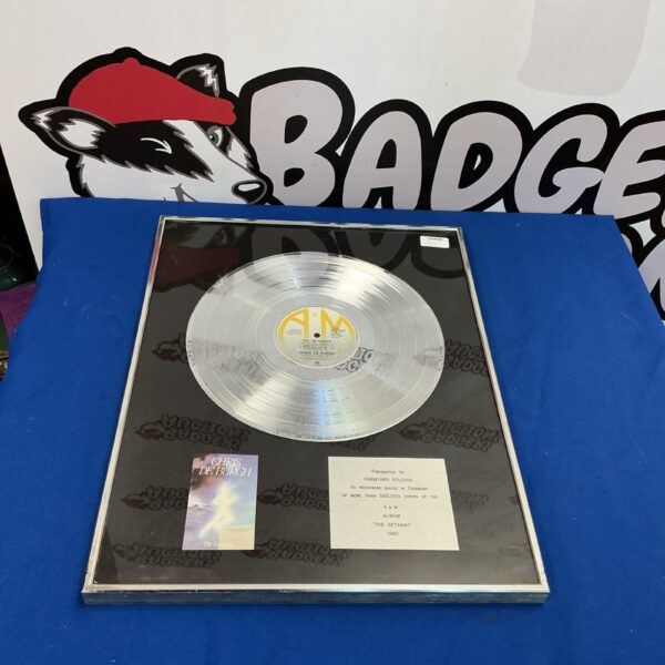 Framed silver disc of Chris De Burgh’s The Getaway album.