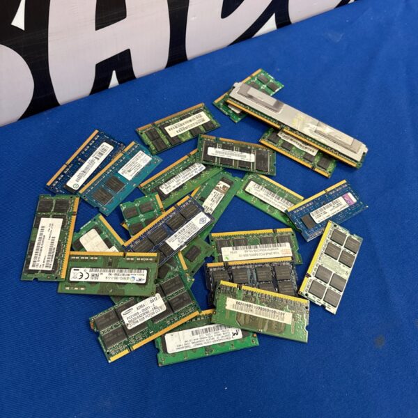 Mixed lot of vintage computer RAM modules for collectors.