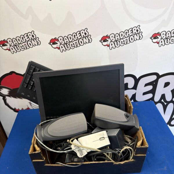 Black computer speakers for PC audio, part of a mixed lot.