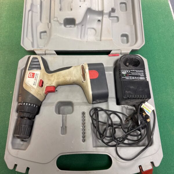Cordless drill in open carrying case, showing the tool and accessories.