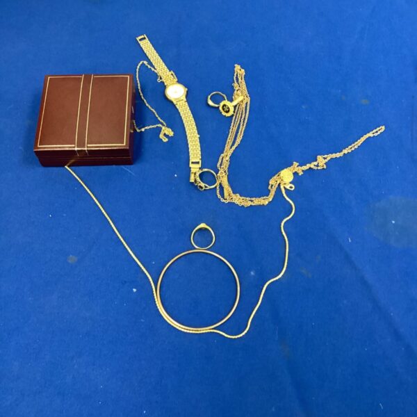 Mixed lot of vintage costume jewellery and wristwatch in a box.