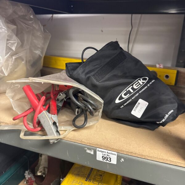 Ctek car battery charger with jump leads in a carry case.