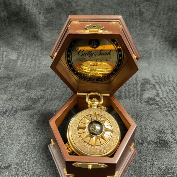 Franklin Mint Cutty Sark watch in hexagonal wooden display case.