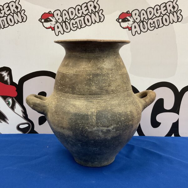 Handmade Cypriot terracotta pot with handles, rustic style.