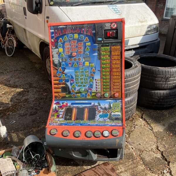 Colourful Dambuster fruit machine top with fruit symbols.