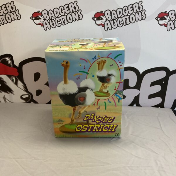 Vintage dancing ostrich toy with bright colours and playful design.