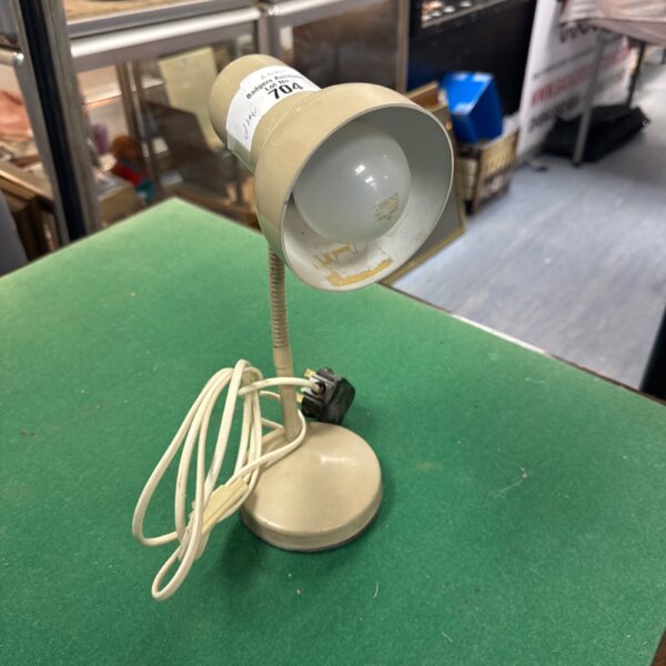 Retro Danish desk lamp with adjustable arm and conical shade.