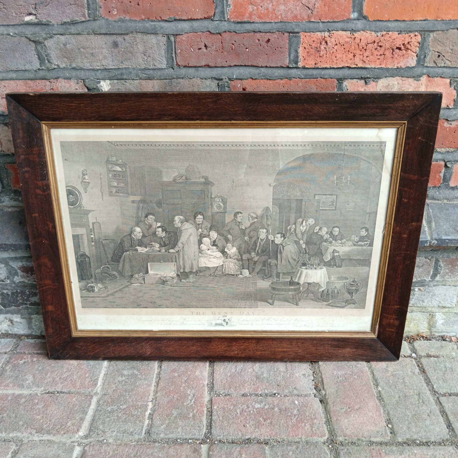 Framed David Wilkie engraving "The Rent Day" from 1877.