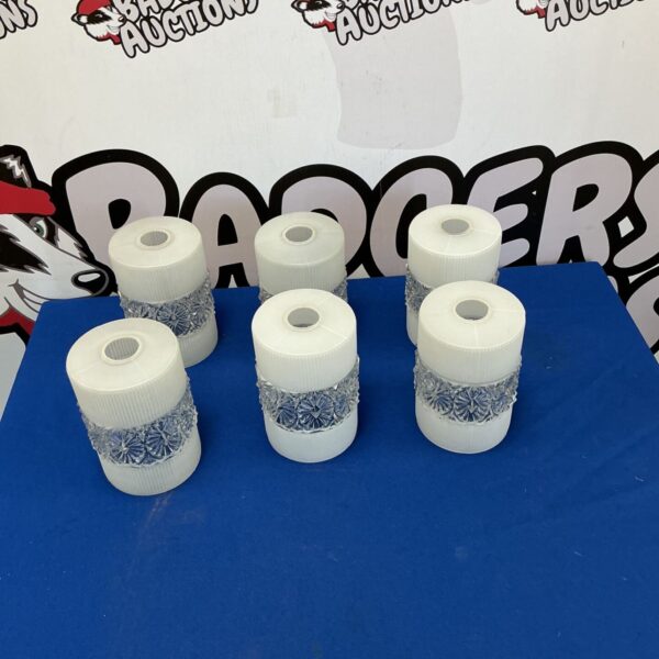 Set of six vintage decorative lamp shades with blue patterns.