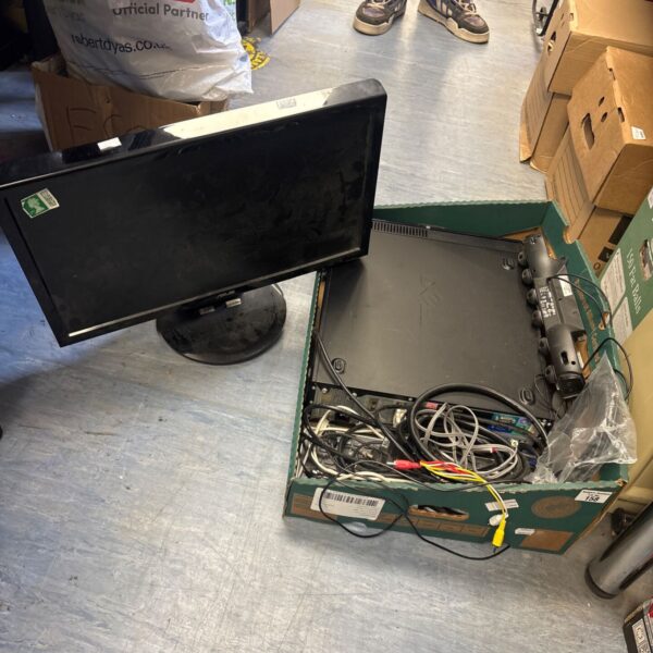 Dell computer setup with ASUS monitor and cables displayed.